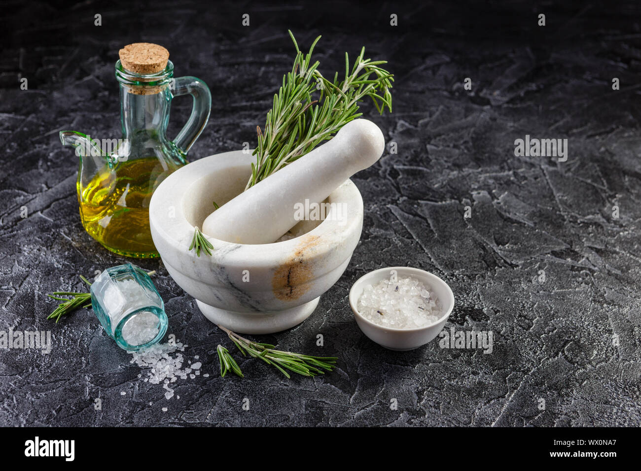 Herbs and Spices, Mortar and Pestle, Rosemary, Olive Oil and Salt Stock
