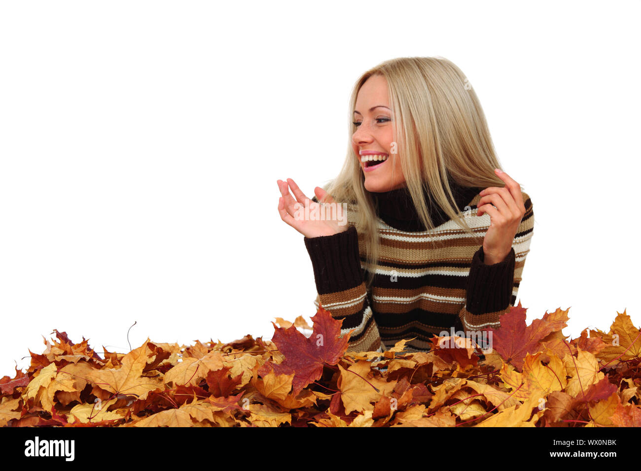 studio portrait of autumn woman in yellow leaves Stock Photo - Alamy