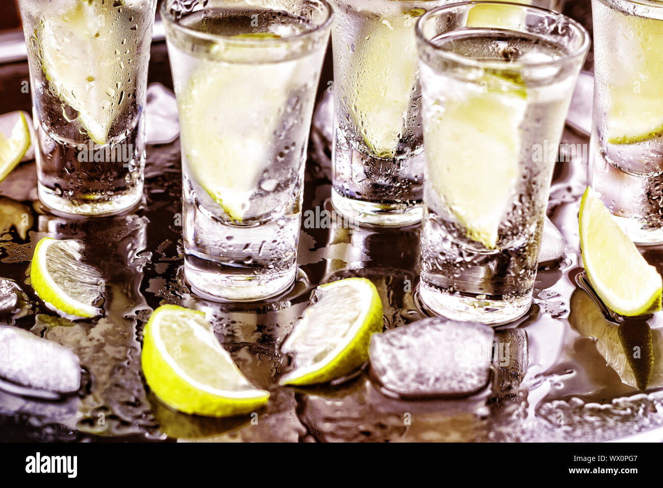 alcohol, cocktail. vodka, gin, tequila with lime. party Stock Photo