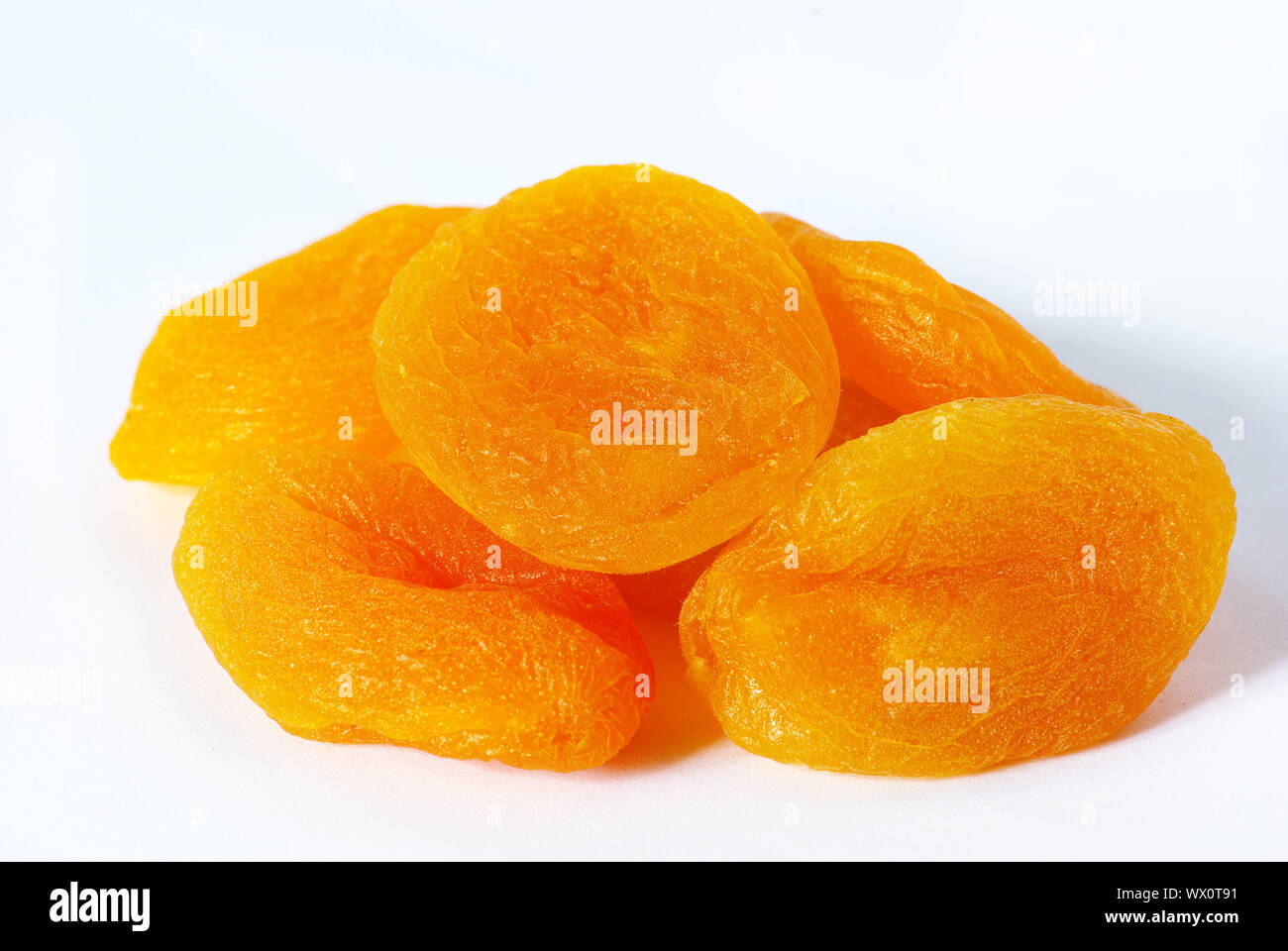 Dried apricot fruits isolated over white background Stock Photo Alamy