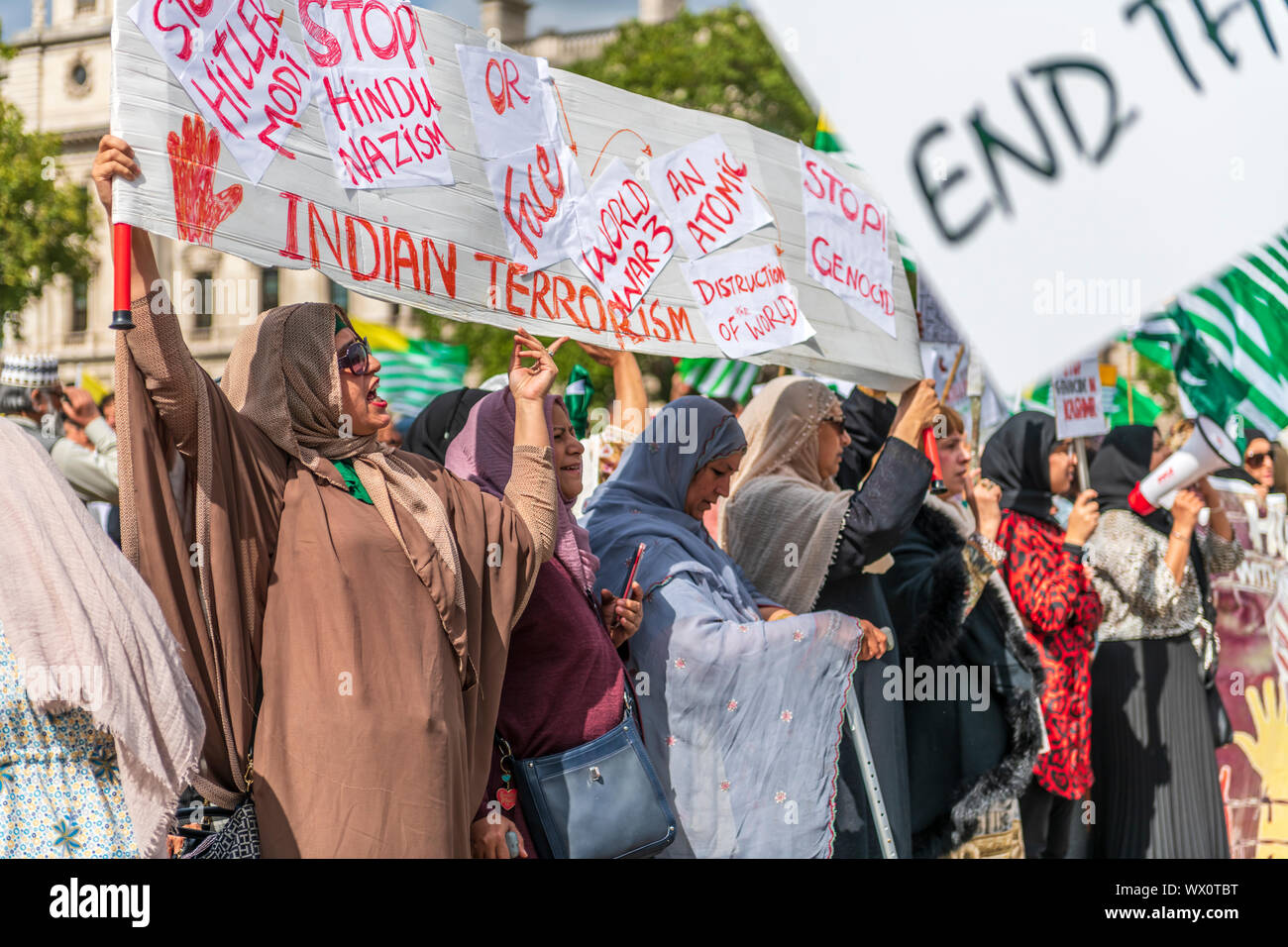 Protesters march on Indian High Commission in London over Modi’s Kashmir ‘lockdown’. Large crowds marched in London from Parliament Square to the Indi Stock Photo