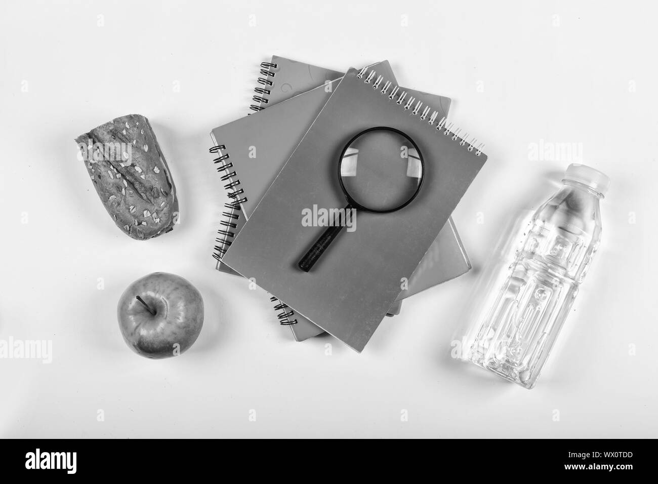 black and white.Back to school concept. school snack. lunchbox, stationery, Free space for text. Cop Stock Photo