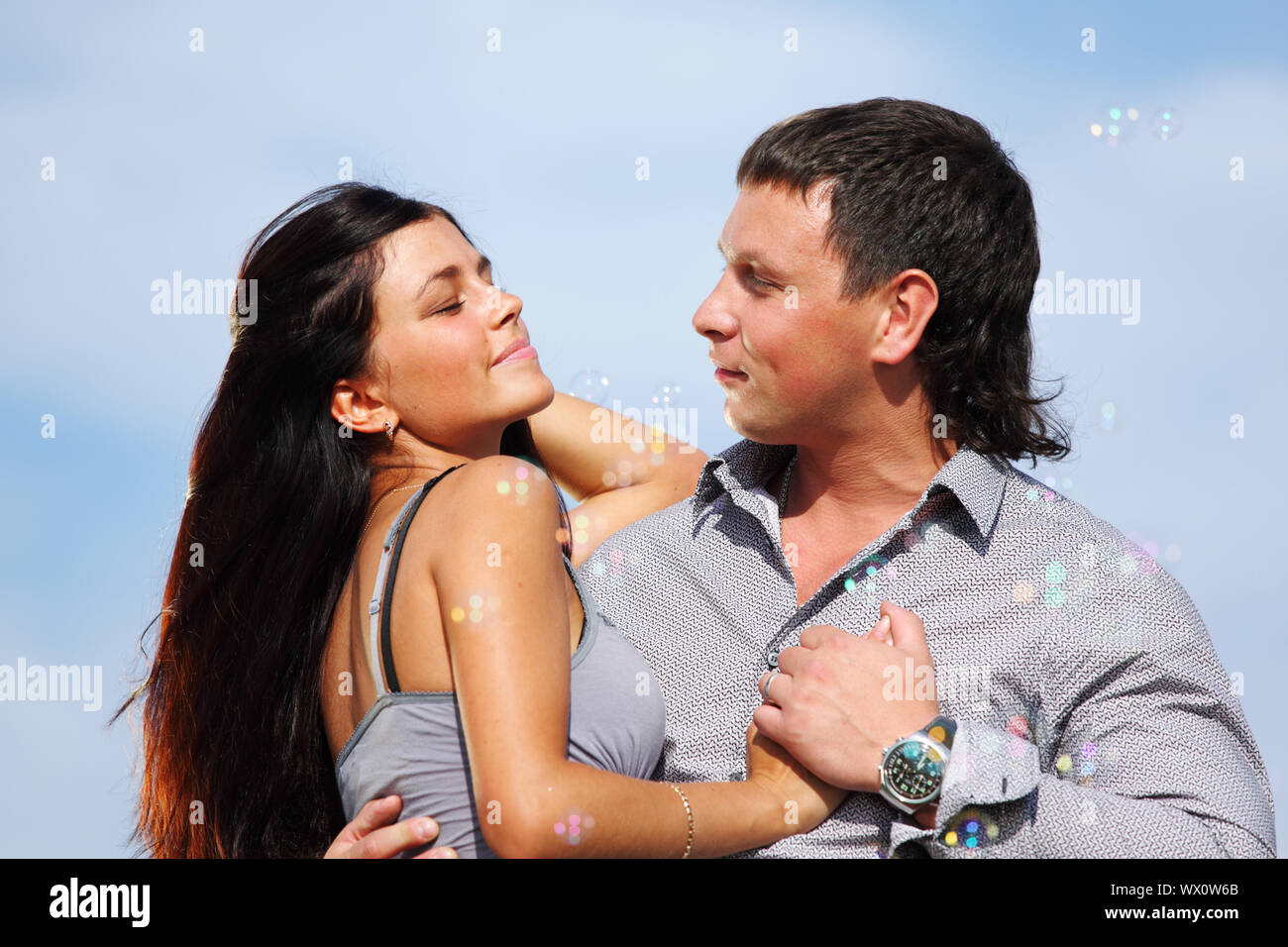 man and woman hug in the sky Stock Photo - Alamy