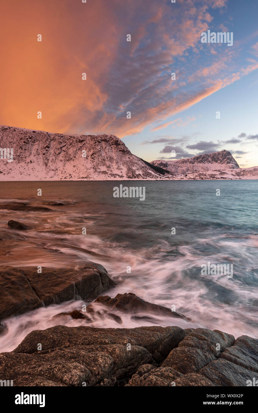 A dramatic sunset at Haukland Beach, Lofoten, Nordland, Arctic, Norway, Europe Stock Photo