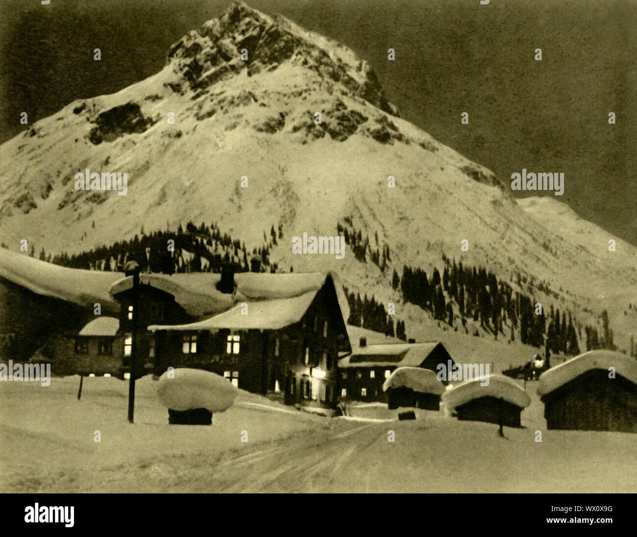 Lech am Arlberg at night, Austria, c1935. The ski resort of Lech by the  Arlberg mountain range, in the state of Vorarlberg. From  &quot;&#xd6;sterreich - Land Und Volk&quot;, (Austria, Land and People). [