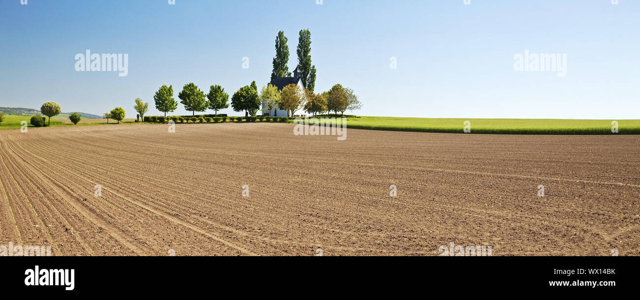 field landscape with little chapel Heilig-Kreuz-Kapelle, Mertloch, Eifel, Germany, Europe Stock Photo