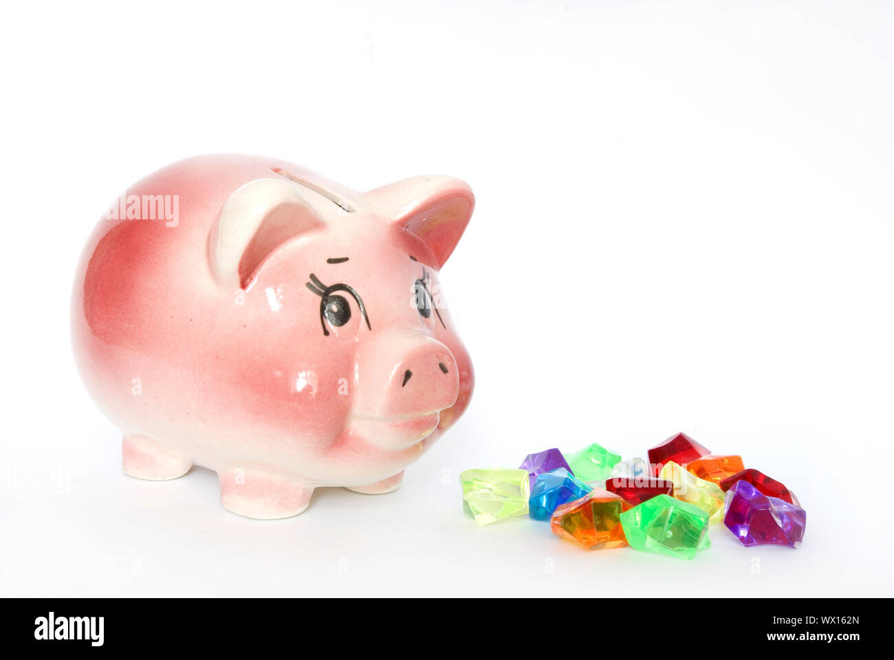 Pink piggy bank isolated on white background Stock Photo - Alamy