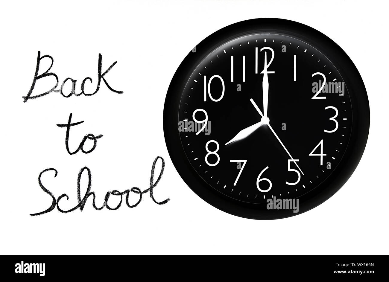 Back to school concept, handwriting on a white chalkboard with big