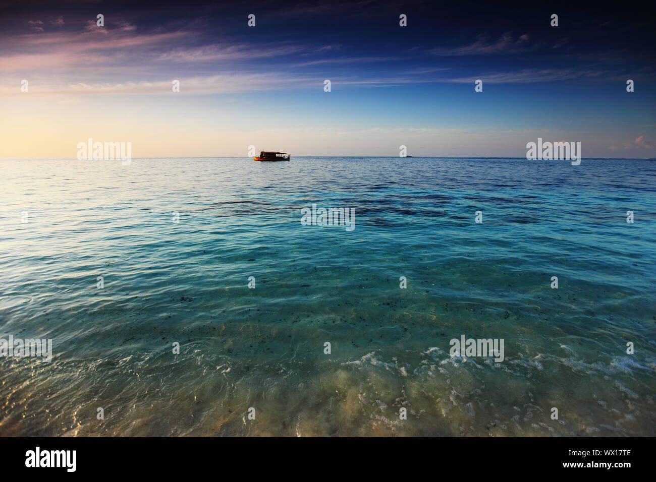 sunset on the sea beach Stock Photo - Alamy