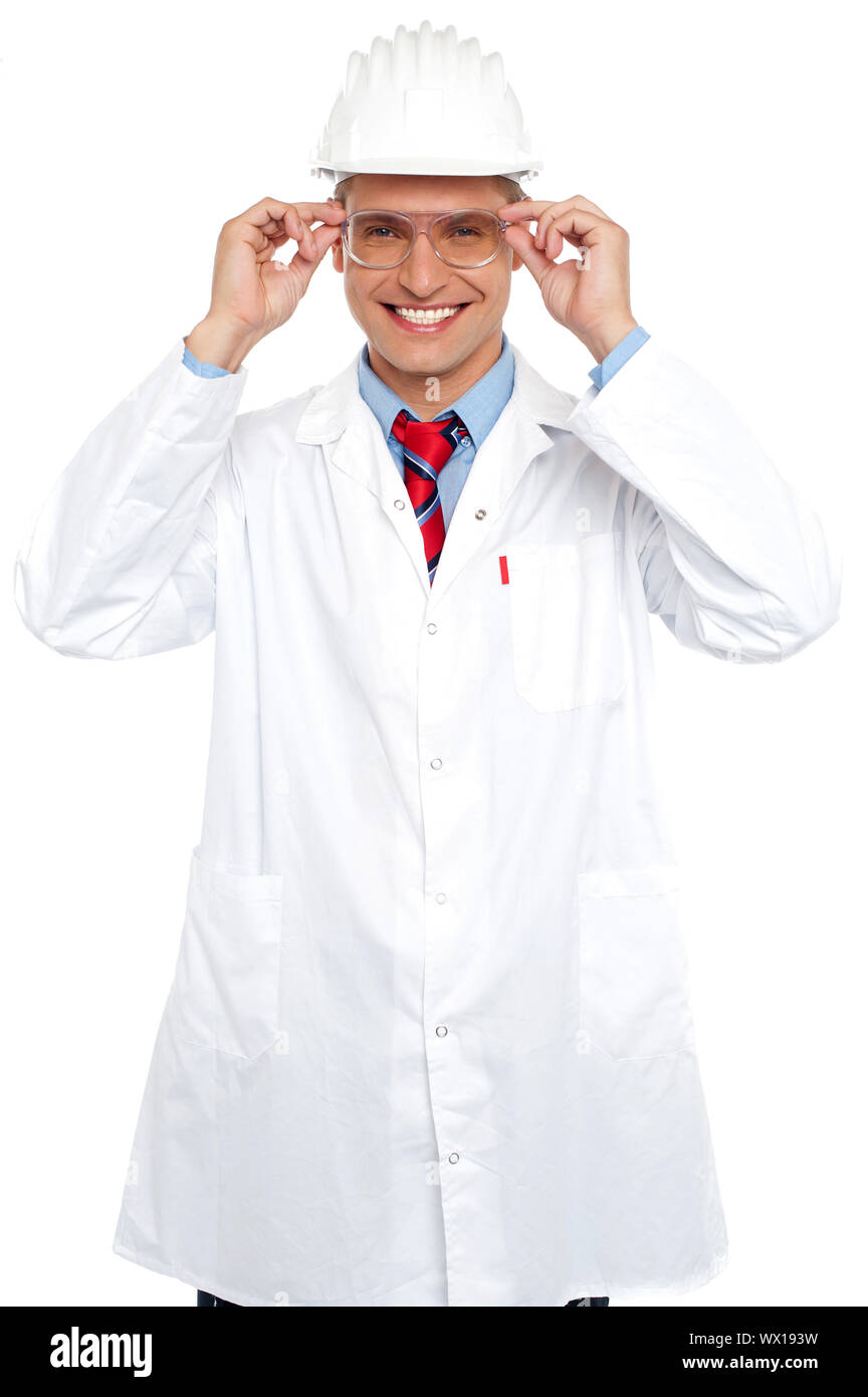 Smiling architect holding eyeglasses isolated on white background Stock Photo