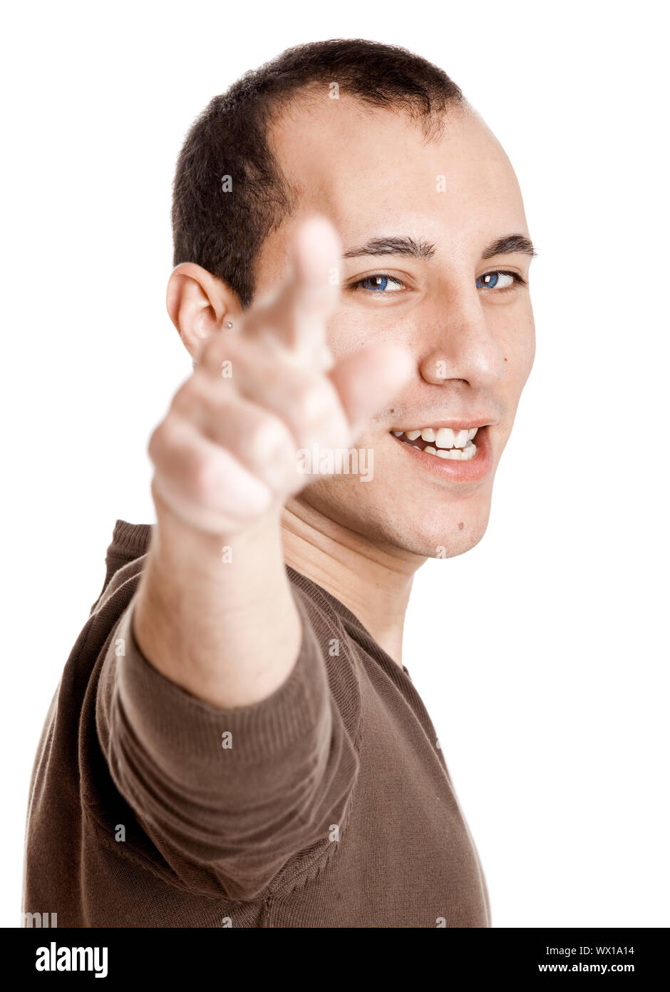 Portrait of a smart guy pointing to something, isolated on white Stock