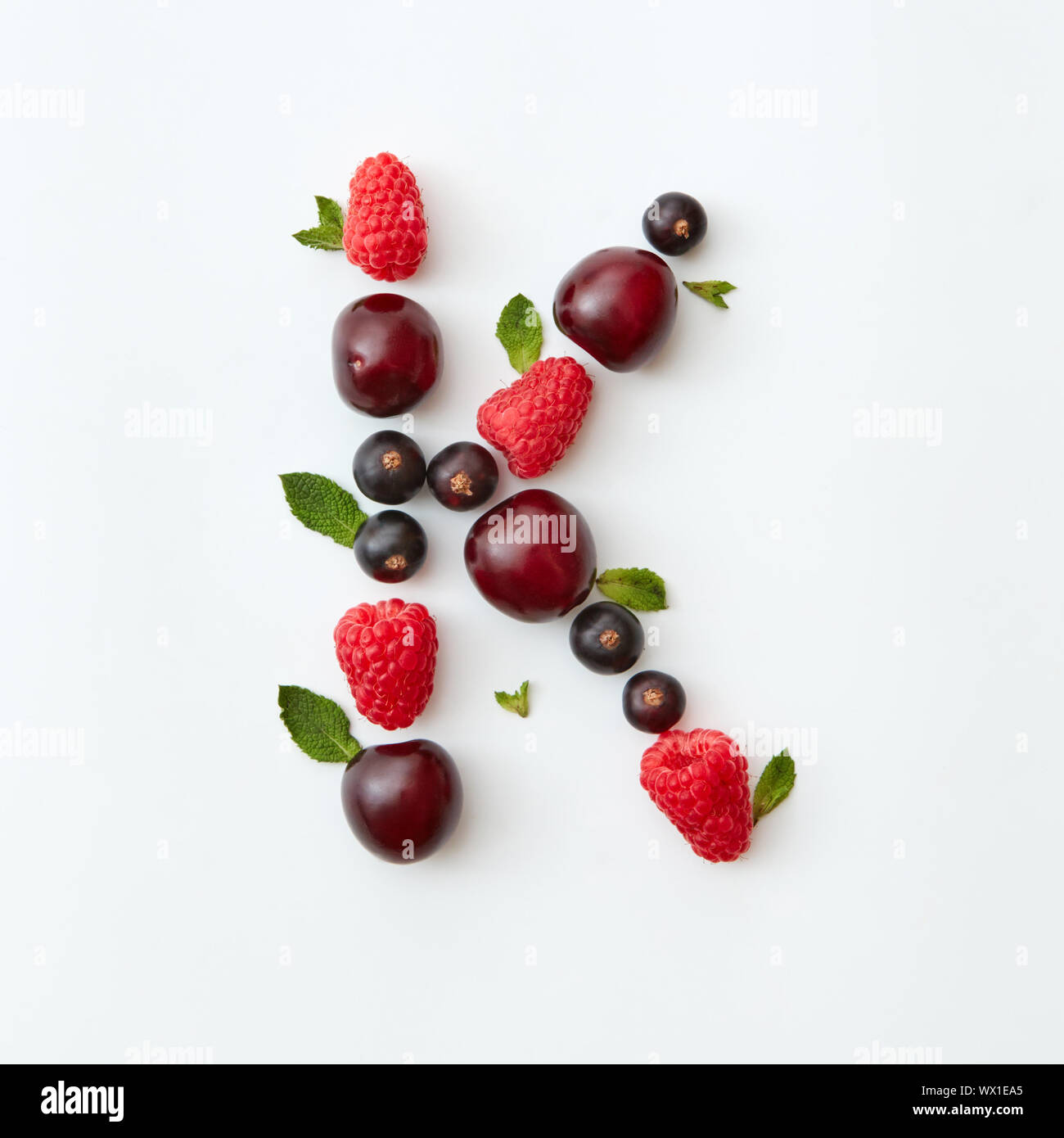Summer pattern of letter K english alphabet from natural ripe berries ...