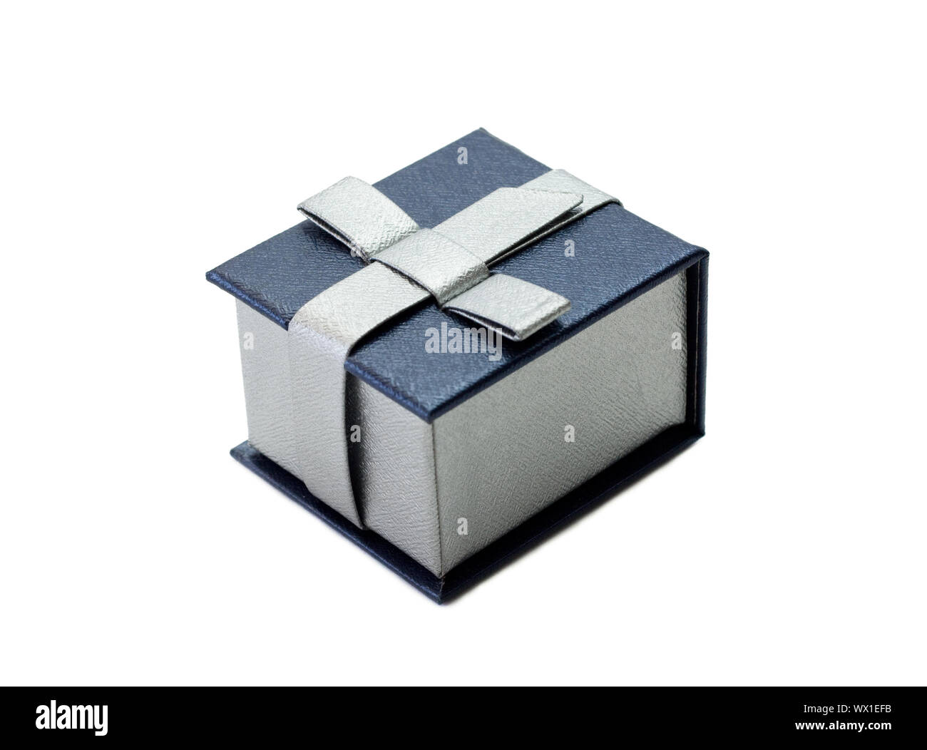 A little blue gift box over white background Stock Photo Alamy