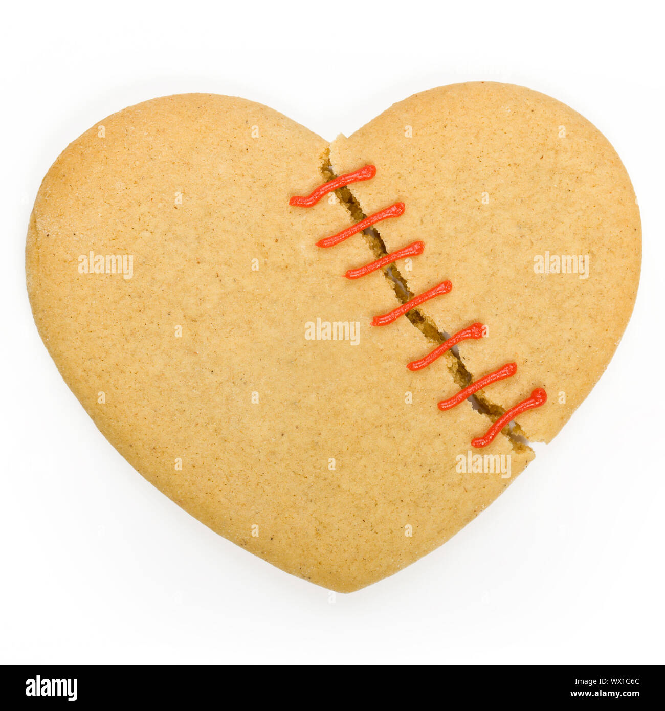Gingerbread cookie in the shape of a broken heart Stock Photo