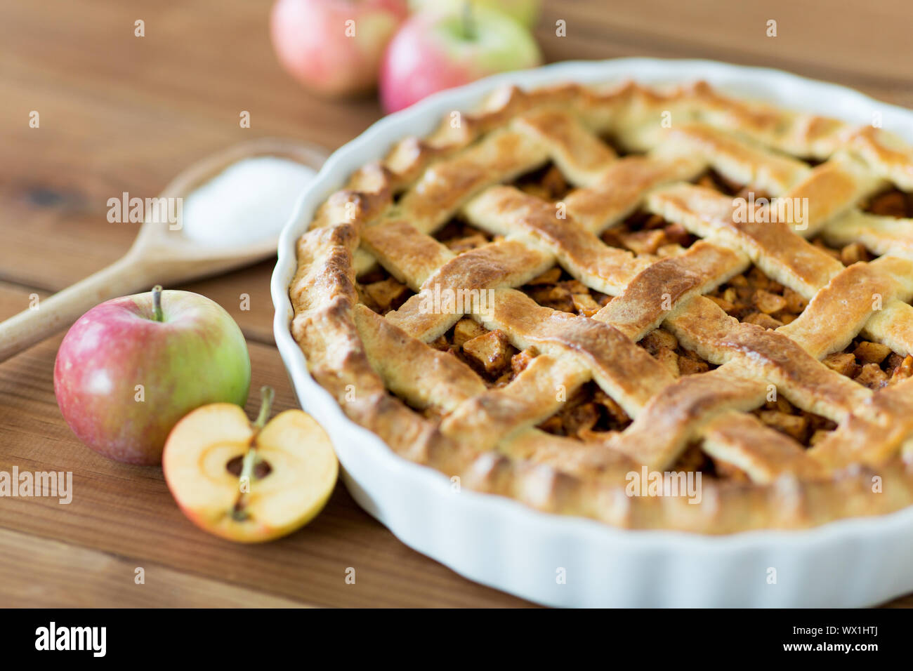 close up of apple pie on wooden table Stock Photo