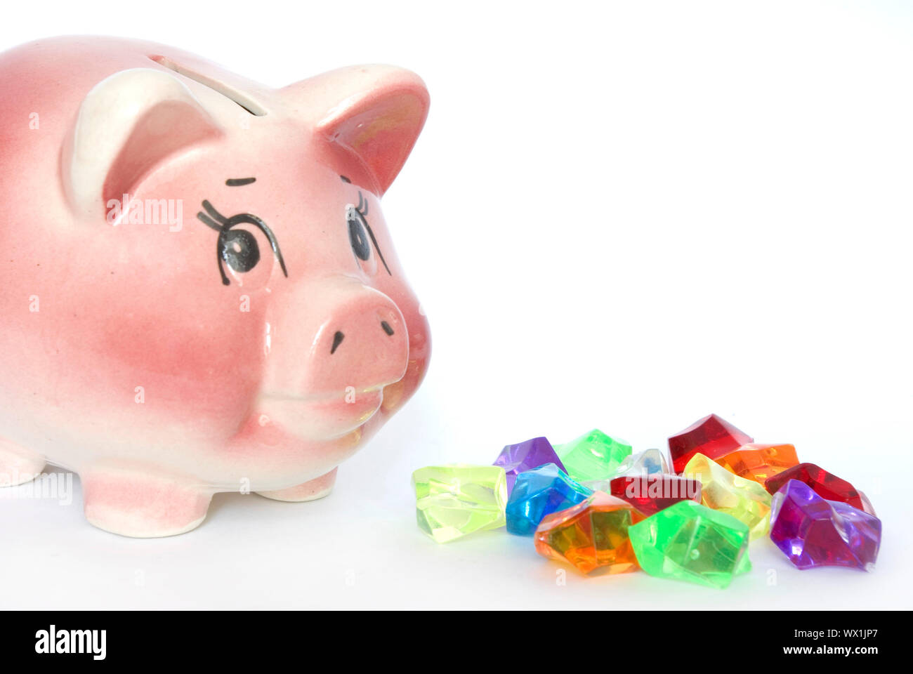 Pink piggy bank isolated on white background Stock Photo - Alamy