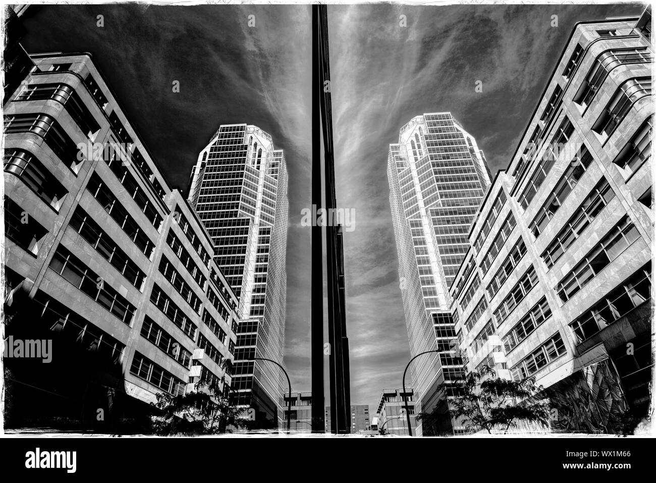 The KPMG Building reflected in the glass walls of the BNP Paribas Building, boulevard Maisonneuve, Montreal Stock Photo