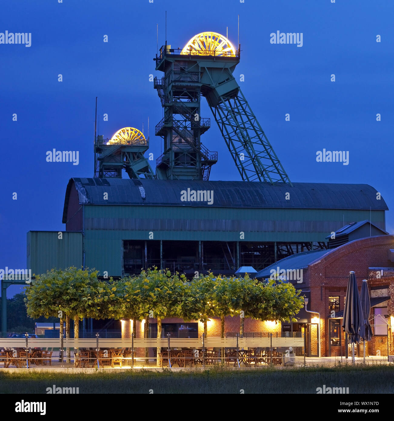 Illuminated Westphalia closed coal mine with event location, Ahlen, North Rhine-Westphalia, Germany Stock Photo