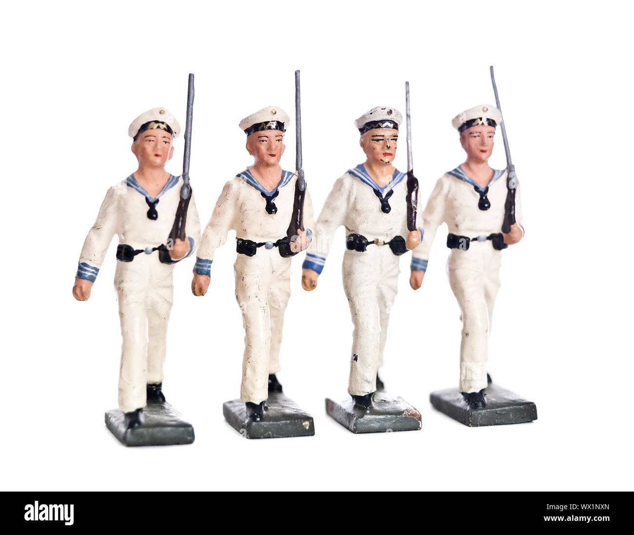 Marching Toy Soldiers isolated on white background Stock Photo