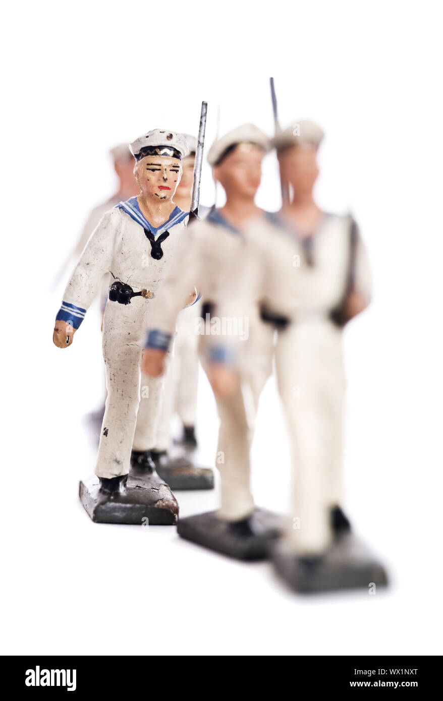 Marching Toy Soldiers Isolated on White Background Stock Photo