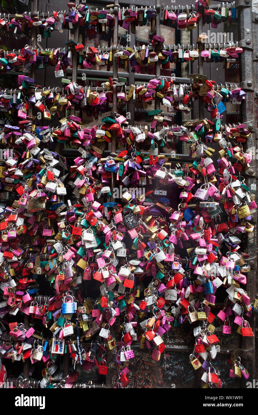An infestation of love-locks on the wall of the courtyard of the Casa di Giulietta (Juliet's House), Verona, Italy Stock Photo
