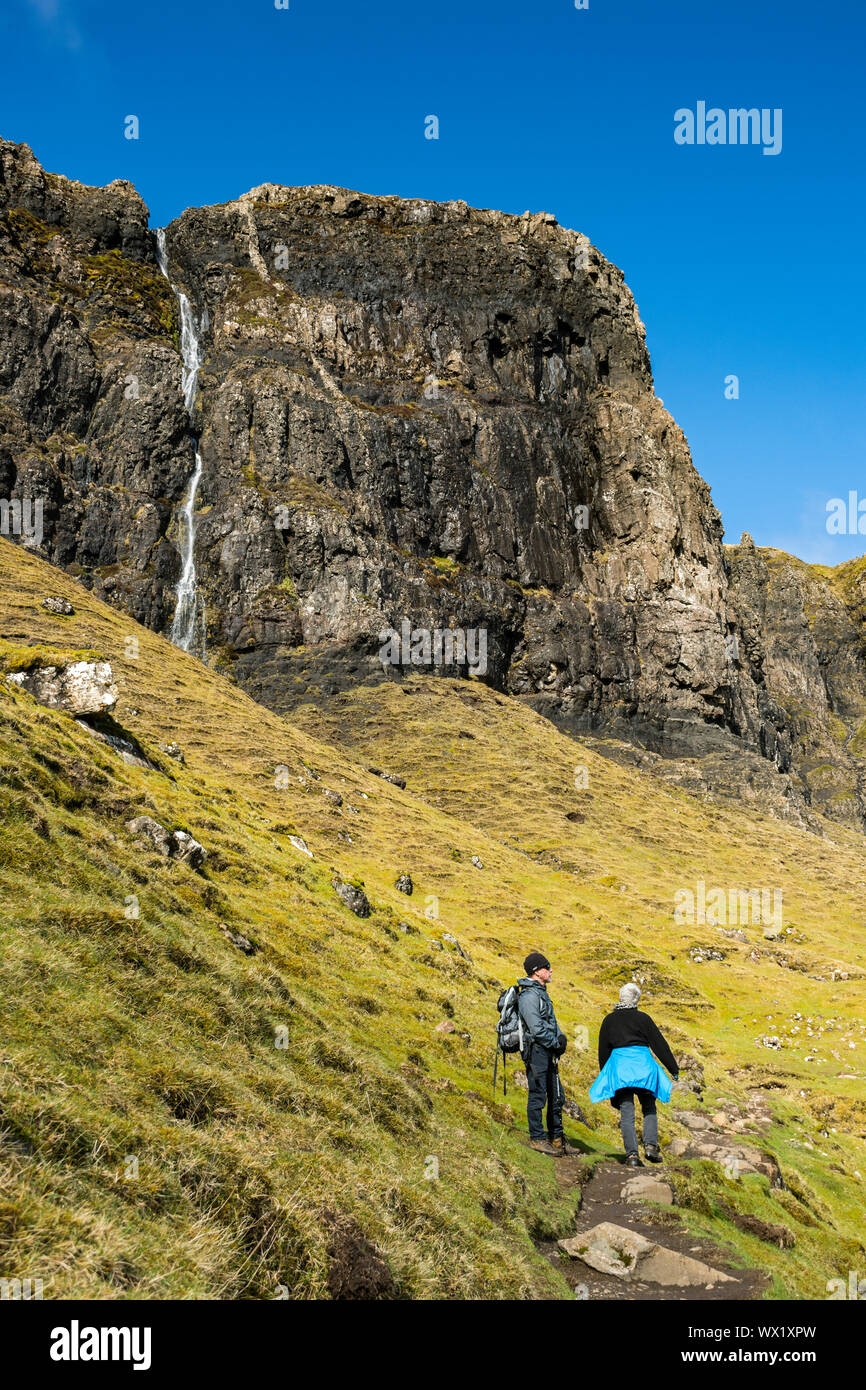 A waterfall pouring off Meall na Suiramach, from the path to the ...