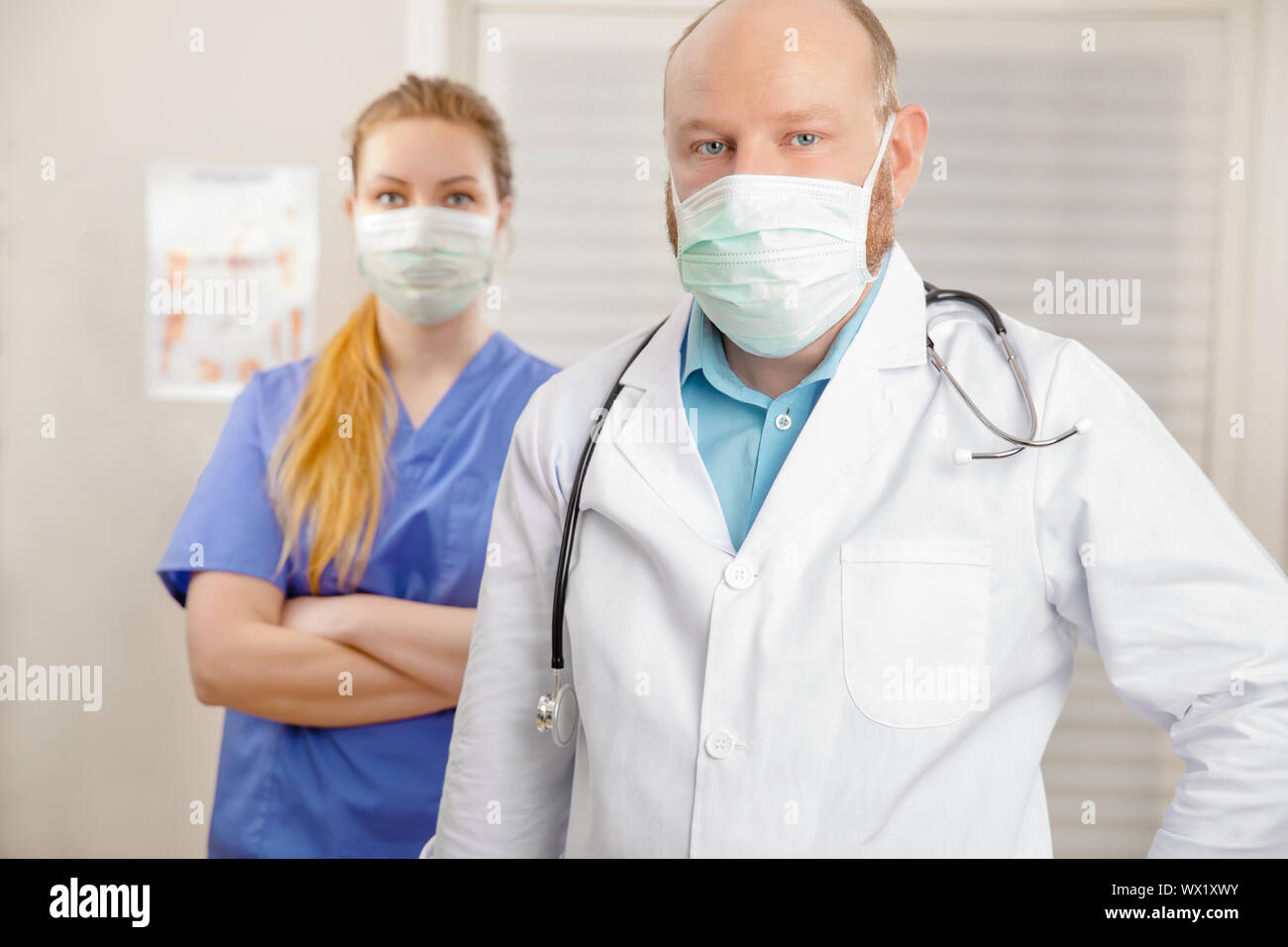 Portrait Of Nurse And Doctor In Hospital Stock Photo