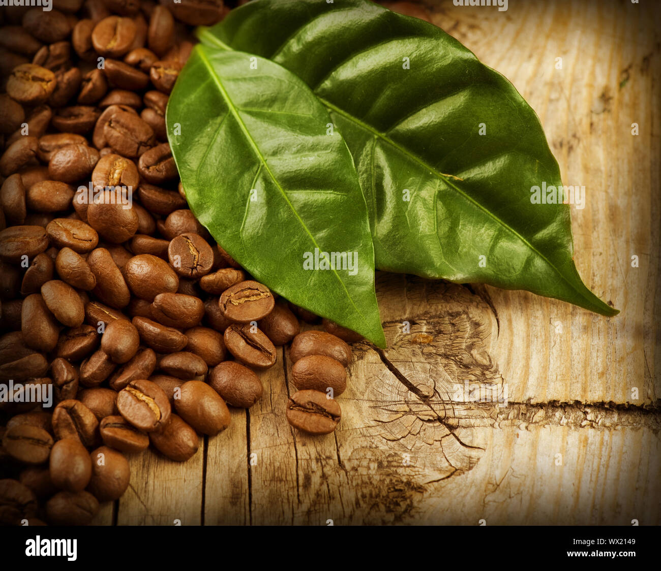 Coffee Beans over Wood Background Stock Photo