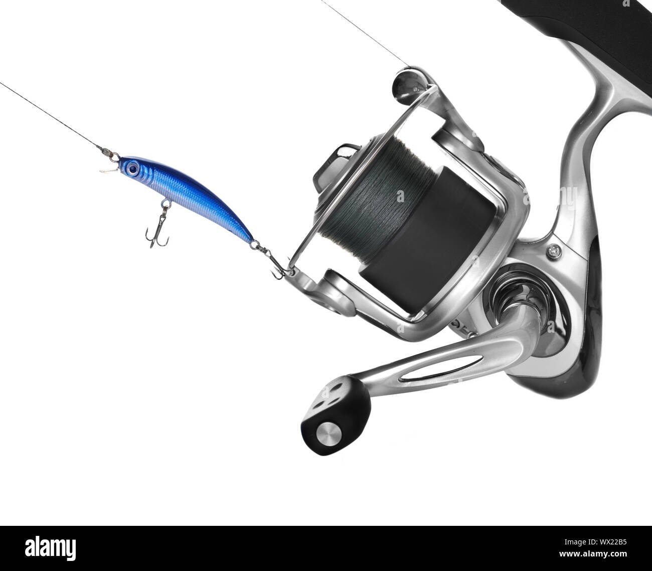 metal pendant on spinning fishing-rod bait Stock Photo - Alamy