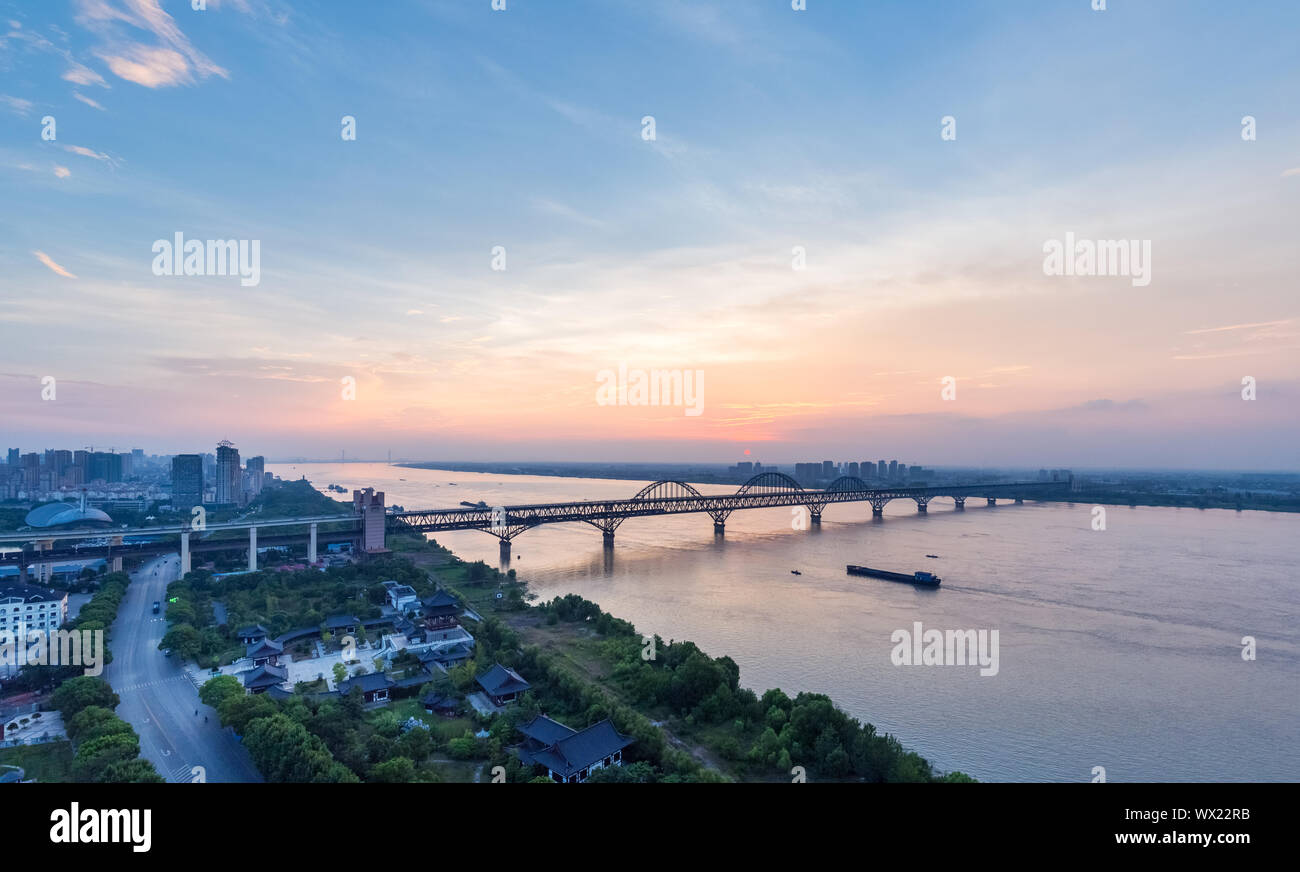 jiujiang yangtze river bridge in sunset Stock Photo