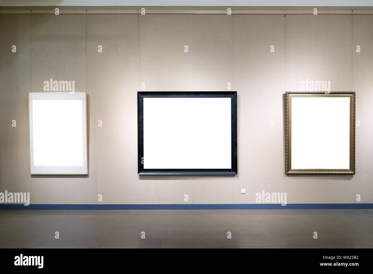 blank picture frames on wall Stock Photo