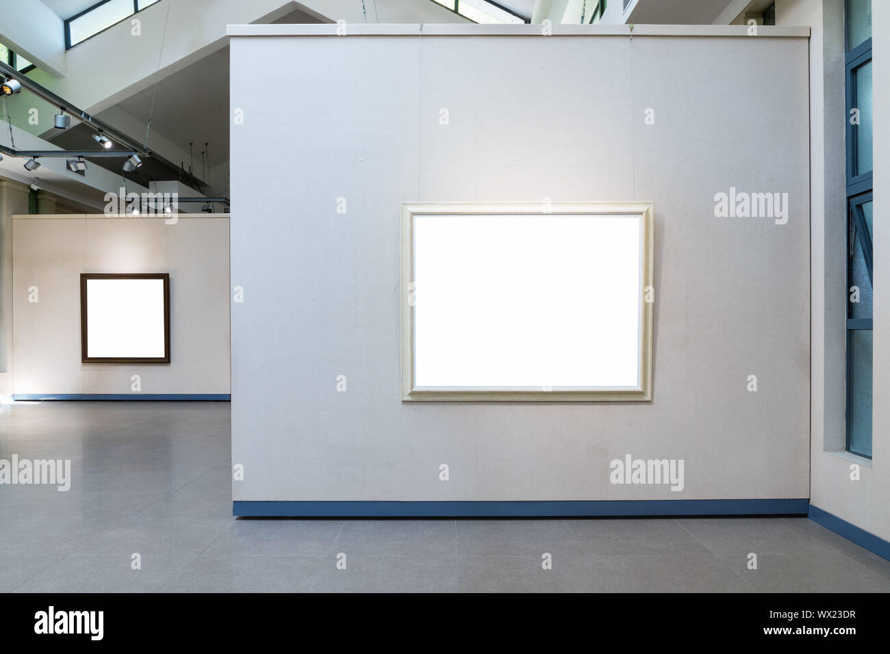 blank frames on exhibition wall in a room Stock Photo