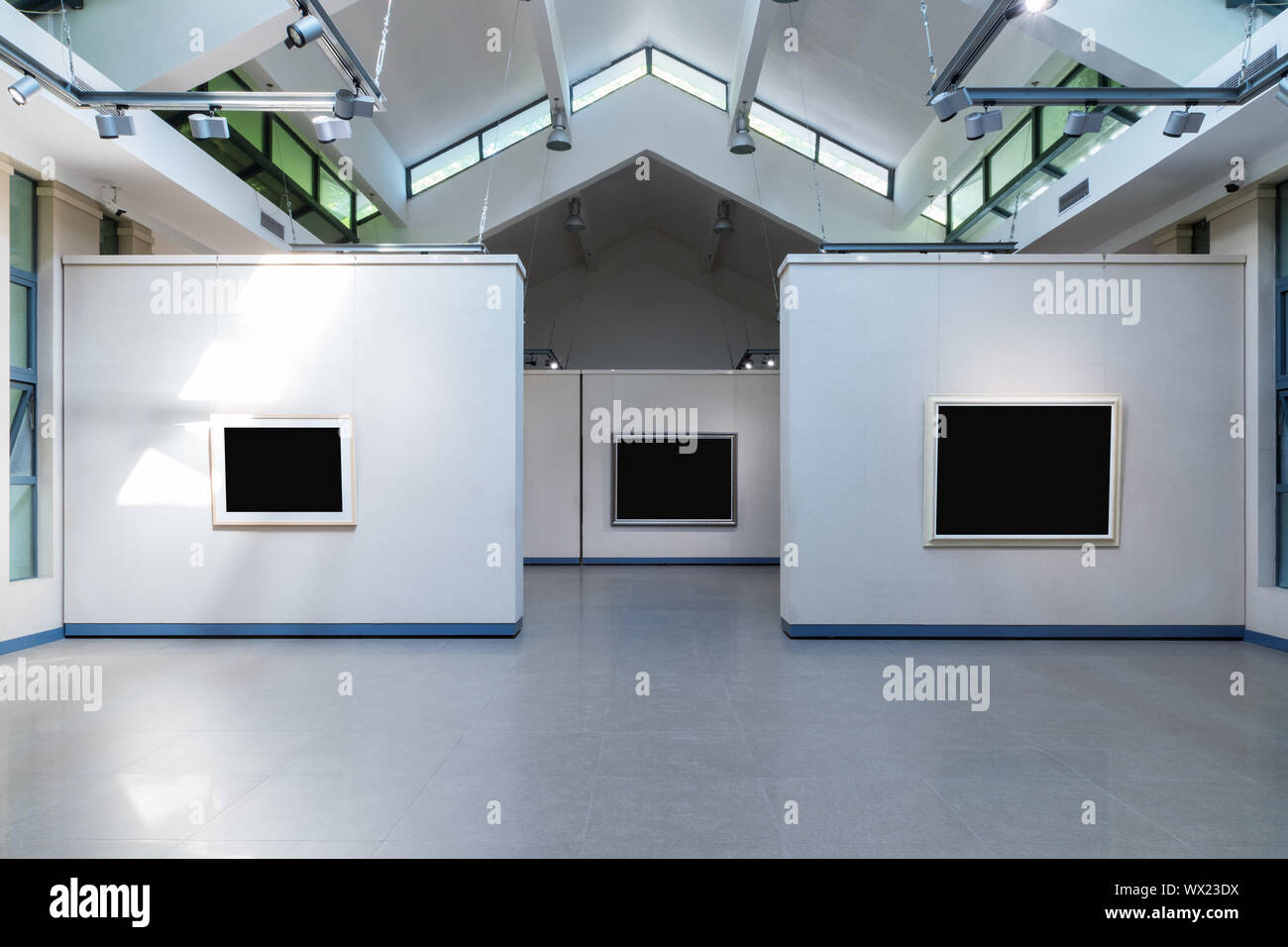 blank frames on exhibition wall in a room Stock Photo