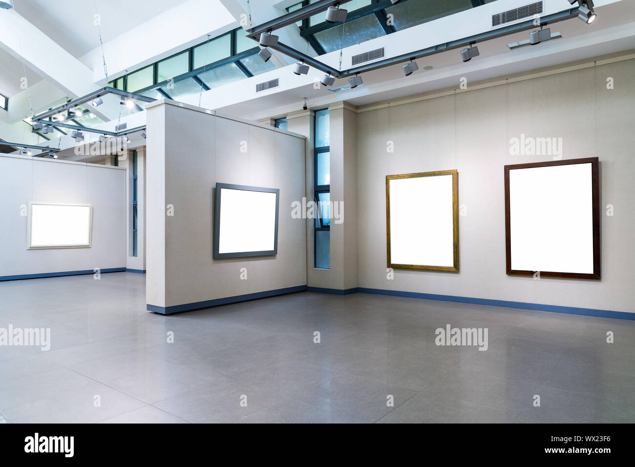 blank frames on exhibition wall in a room Stock Photo