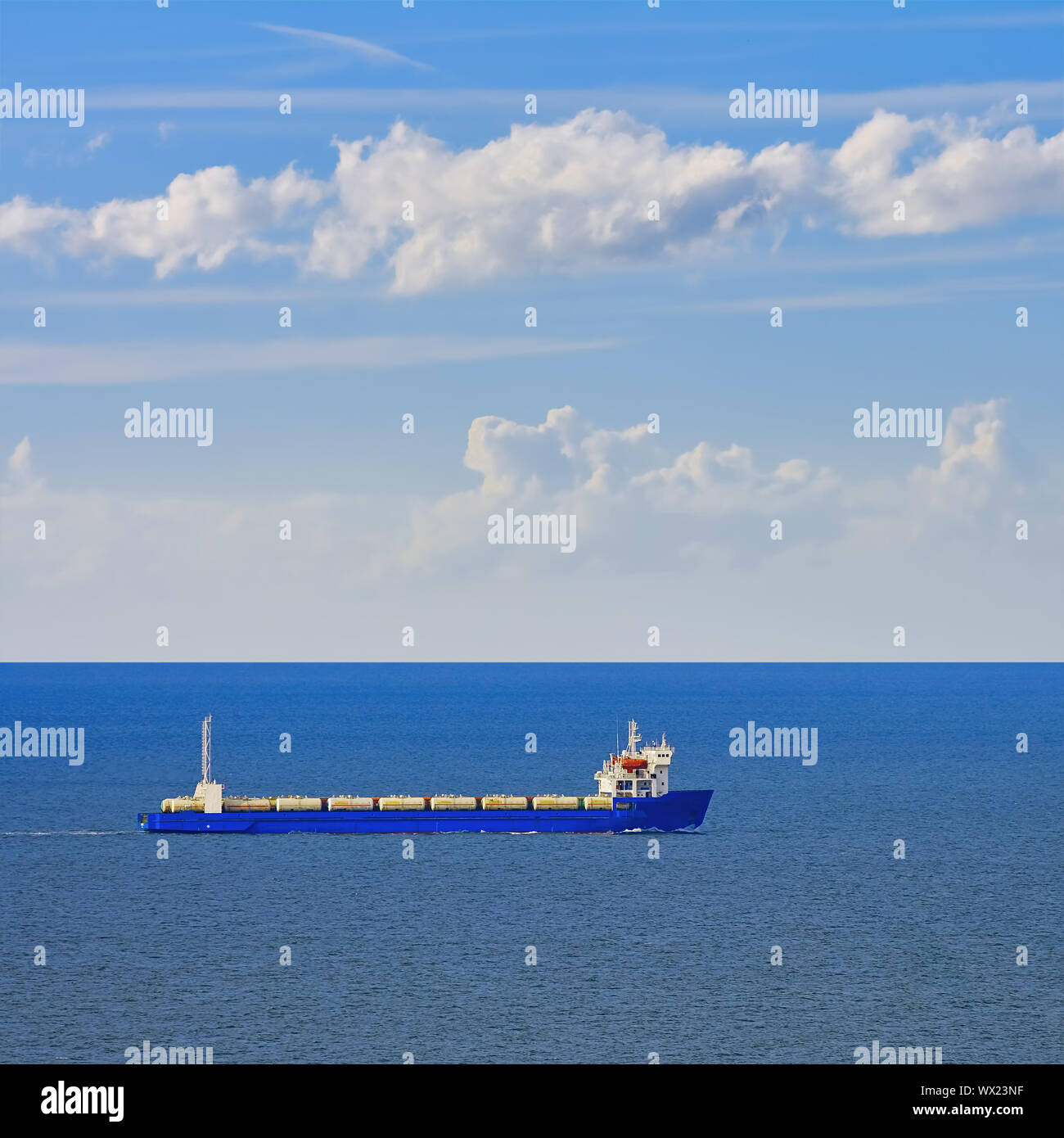 Container Ship in the Sea Stock Photo