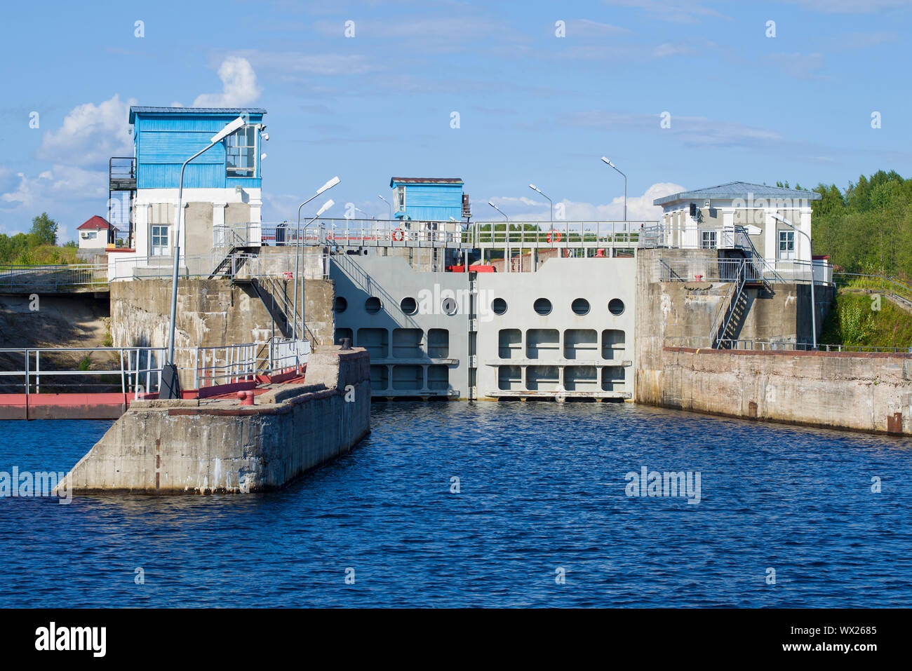POVENETS, RUSSIA - AUGUST 17, 2019: Gate of gateway No. 3 of the White Sea-Baltic Canal close-up on a sunny summer day. Karelia Stock Photo