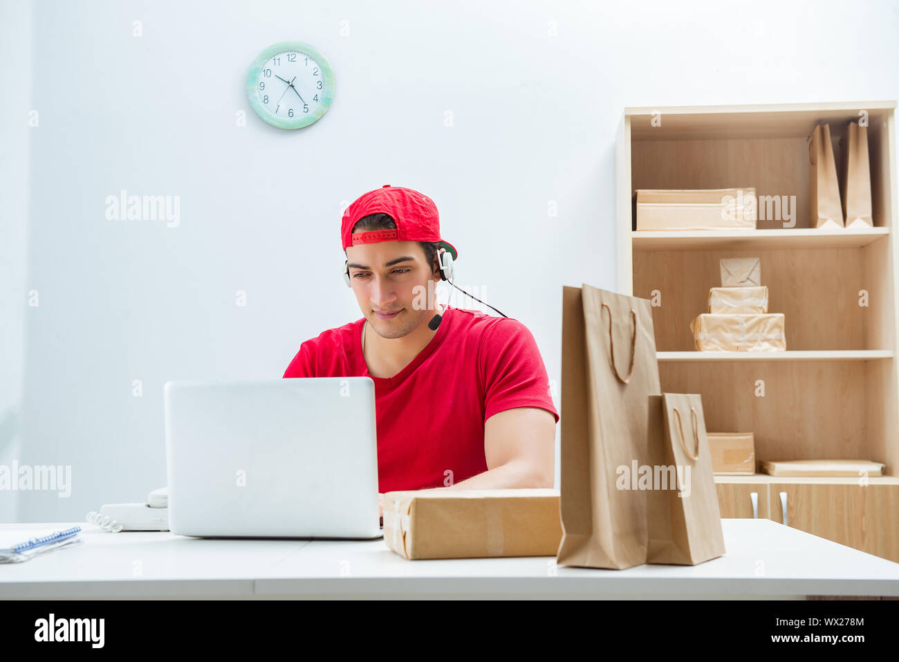 The call center worker at parcel distribution center in post office ...