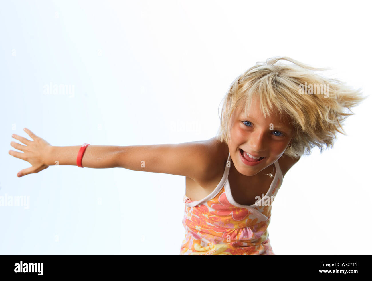 Happy Cute Little Girl Over Blue Sky Stock Photo - Alamy