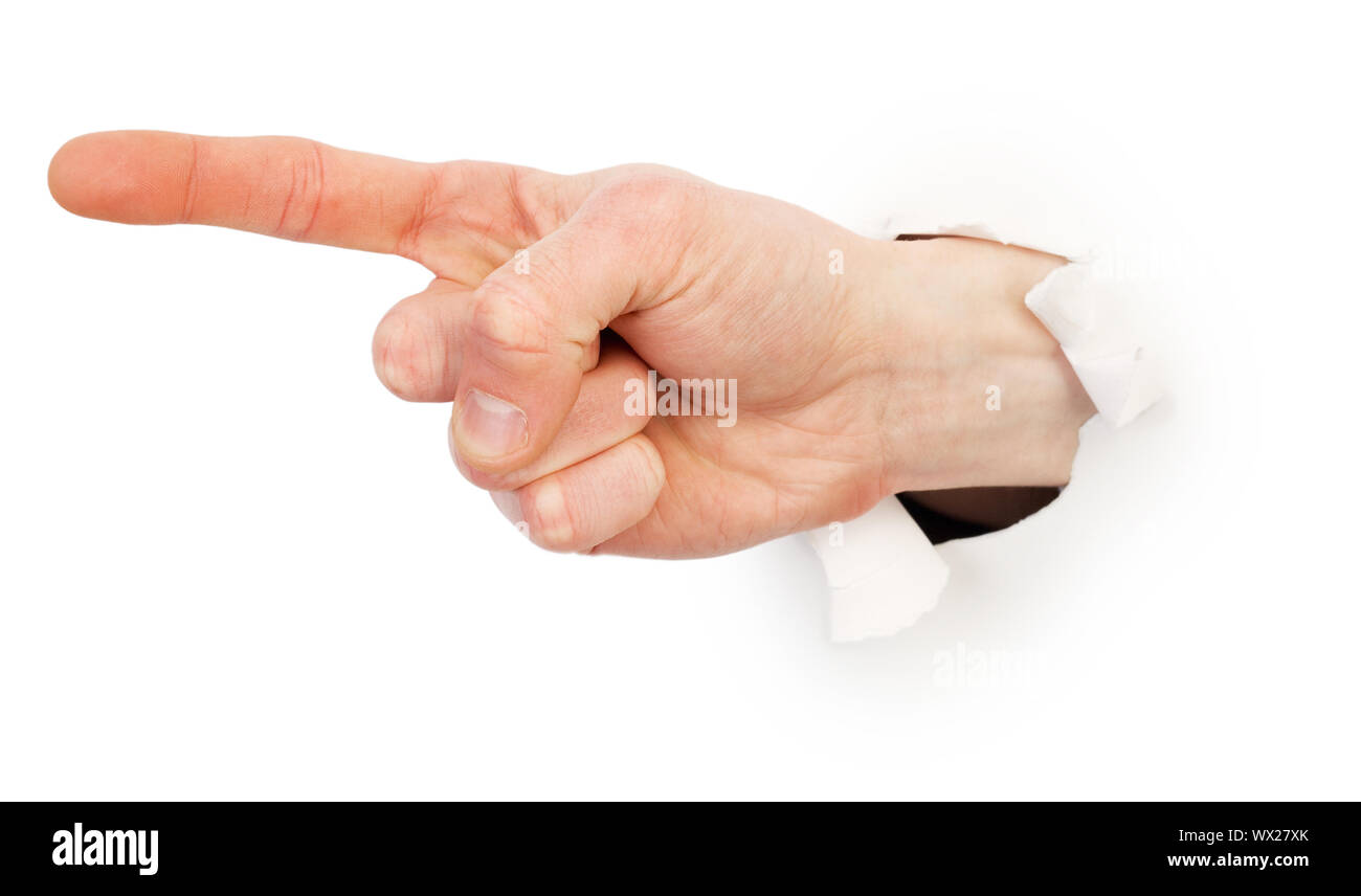 Gesture male hand through white paper photographed on a white ...