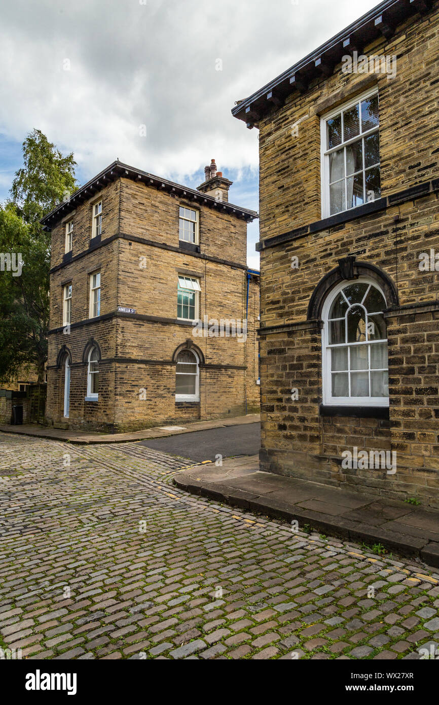 Albert Terrace, Saltaire, Yorkshire, England. Saltaire is a model Victorian village and is a UNESCO World Heritage Site. Stock Photo