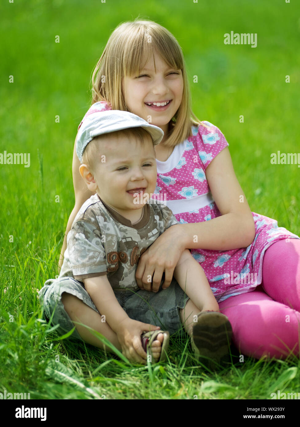 Happy Kids. Sister And Brother Outdoor Stock Photo - Alamy