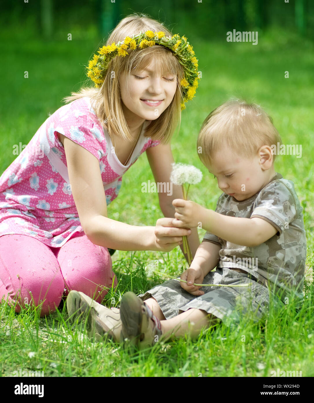 Happy Kids. Sister And Brother Outdoor Stock Photo - Alamy
