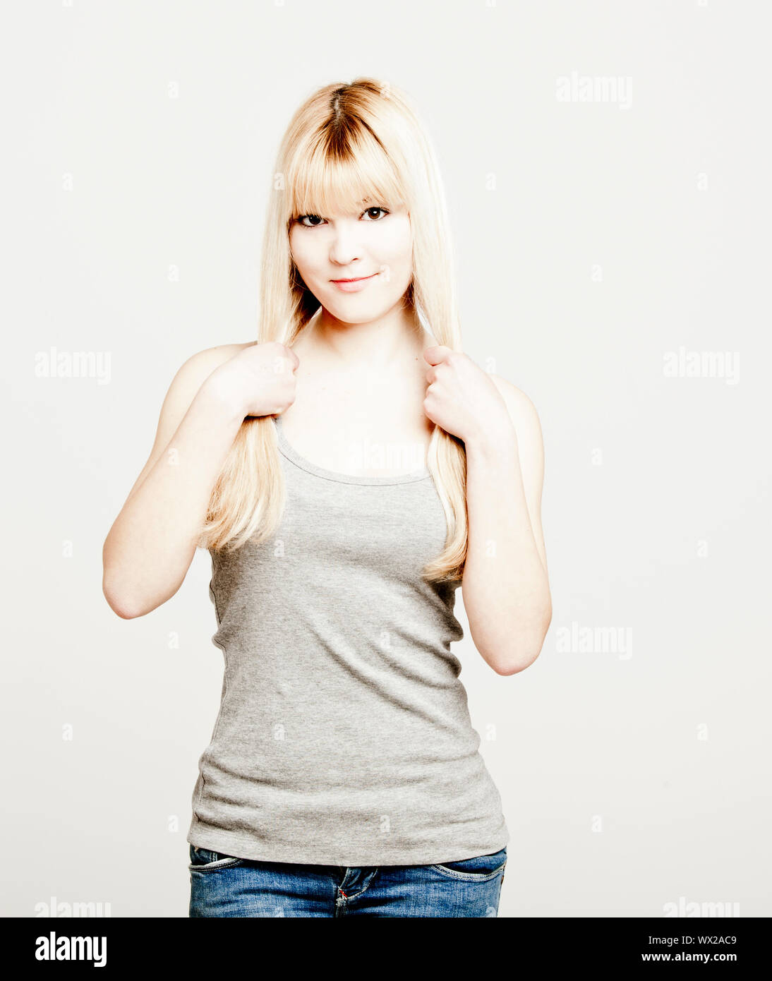 Portrait of a young and beautiful blonde woman Stock Photo - Alamy