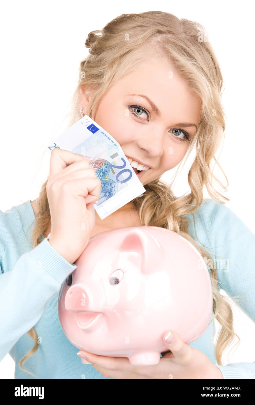 picture of lovely woman with piggy bank and money Stock Photo - Alamy