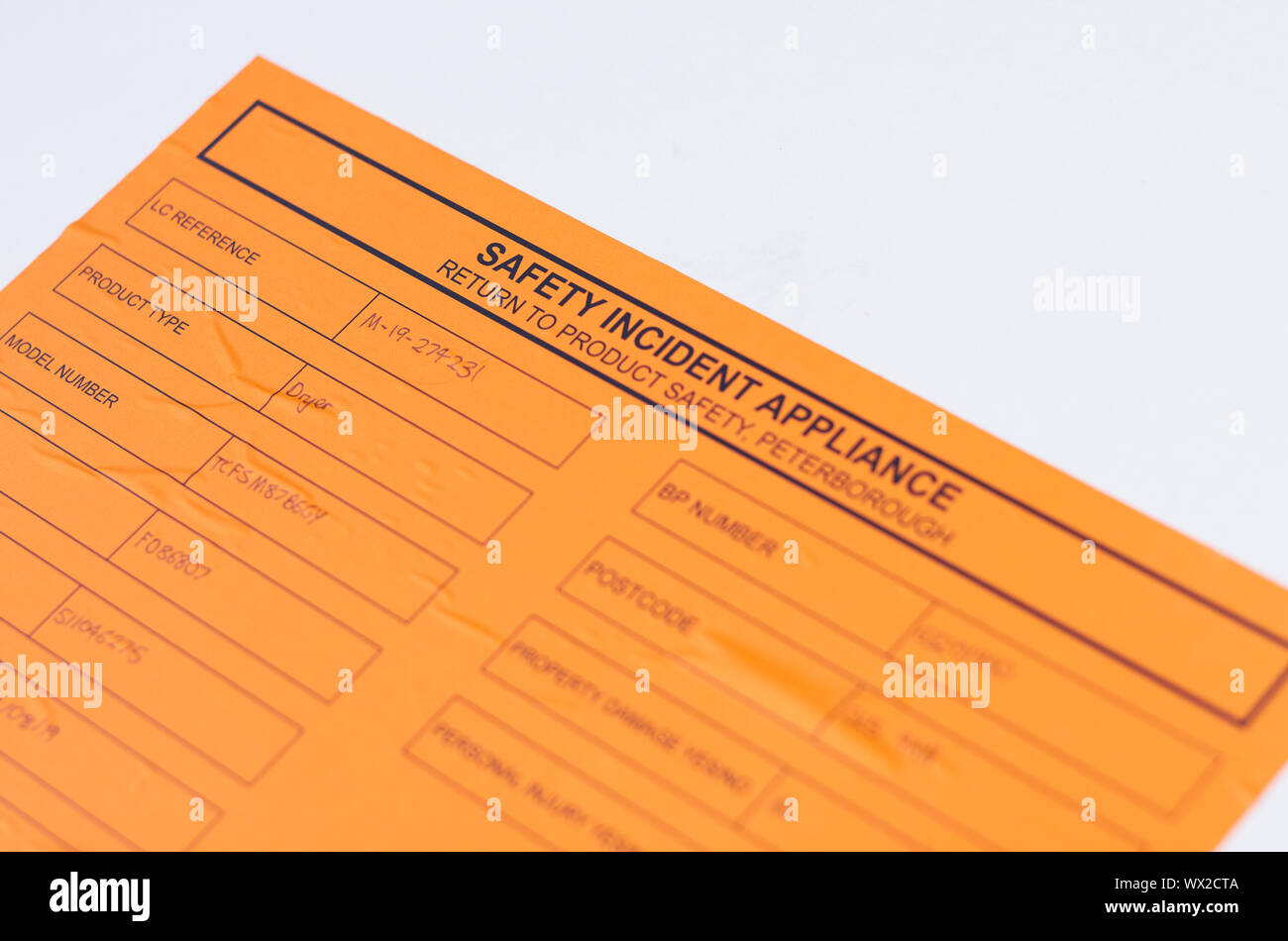 Safety incident notice on a Hotpoint Whirlpool tumble dryer Stock Photo