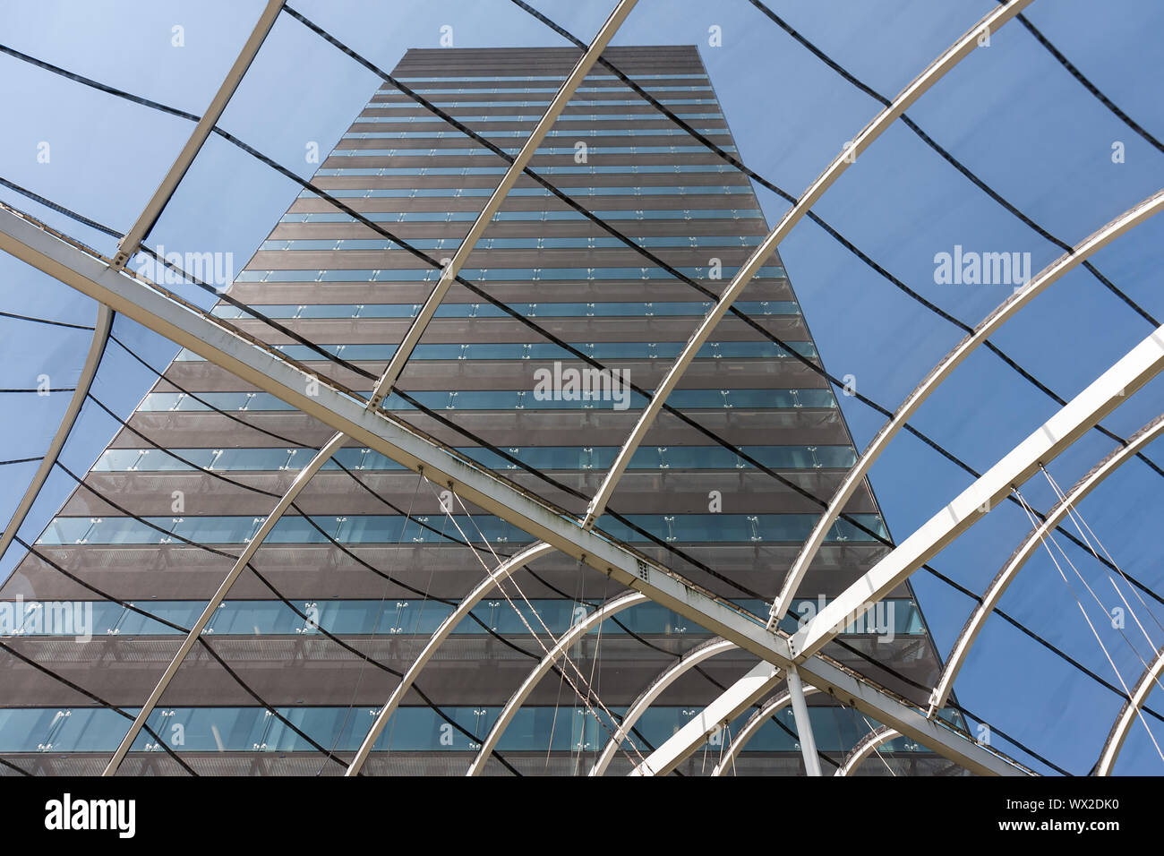 View at a big office building from within the entrance hall with glass roof Stock Photo