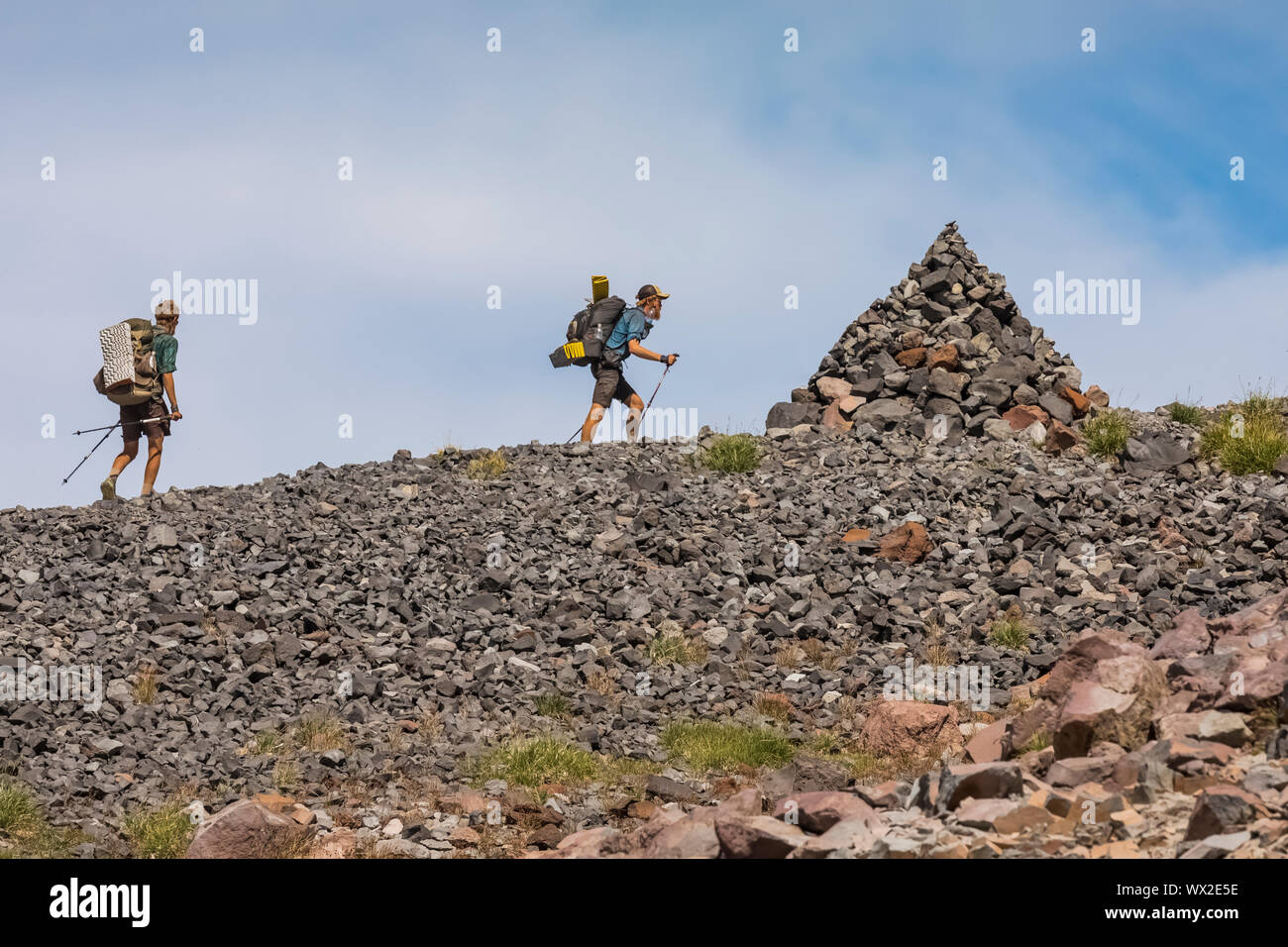 Giffer Rocks Thru-hikers approaching a perfect cairn along the Pacific Crest Trail ...