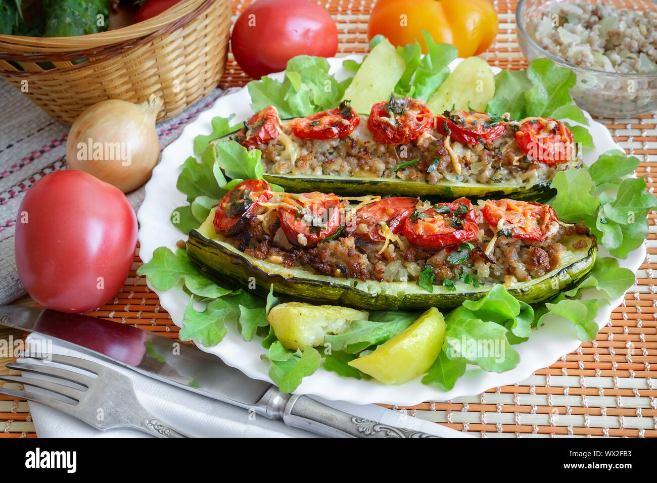 Stuffed with minced meat zucchini on a plate Stock Photo Alamy