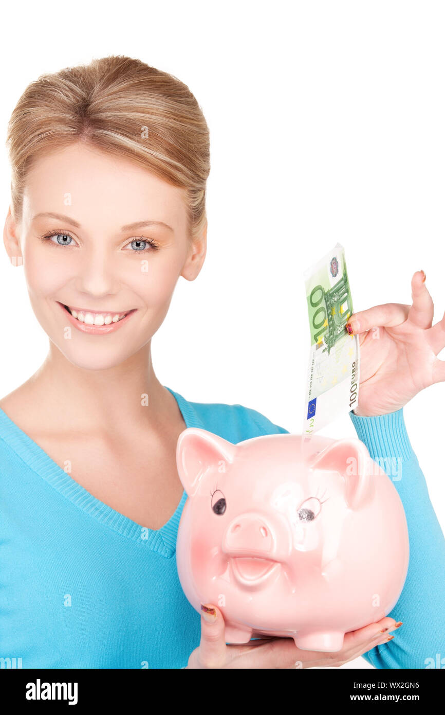 picture of lovely woman with piggy bank and money Stock Photo - Alamy