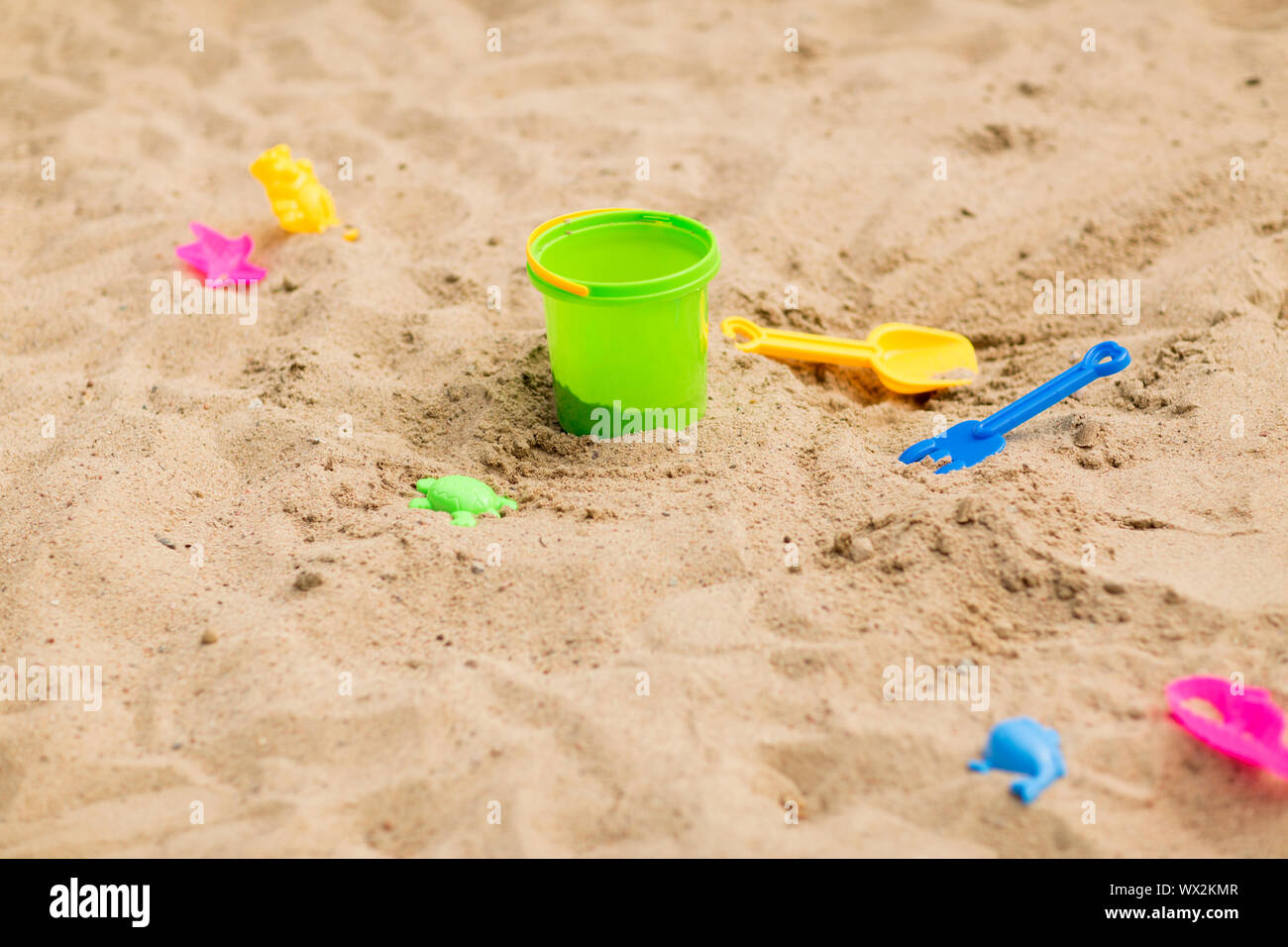 bucket and sand toys on beach or in sandbox Stock Photo Alamy